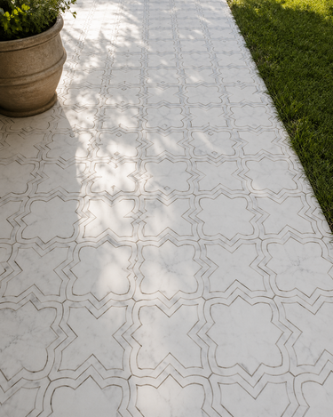 White Dolomite and Turkish Carrara marble mosaic tiles by Mythology Tile, showcasing intricate waterjet-cut mosaic art.