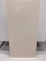 Honed Limra Limestone 12x24 natural stone tile with a smooth surface, showcasing earthy beige tones and rectangular shape.