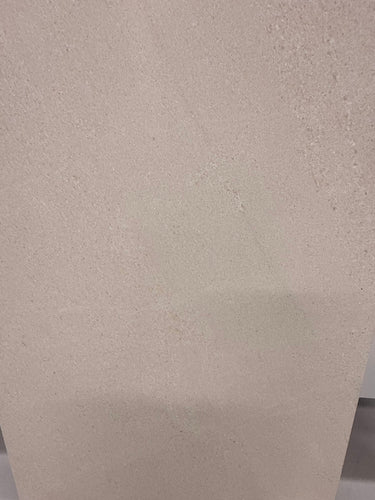 Honed Limra Limestone 12x24 natural stone tile with a smooth surface, showcasing beige and gray tones for floor or wall use.