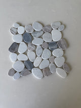 Natural stone pebble mosaic tile by Roca, 11x11 inch Mist Mix mosaic with smooth, rounded pebbles for decorative surfaces.