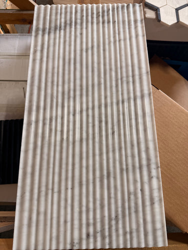 MosaicBros Carrara polished 3D fluted marble mosaic tile in 12x24 size, showcasing elegant textured stone surface.