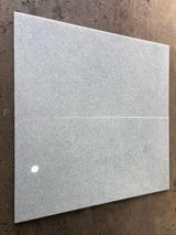 Polar white natural stone tile by RN, 24x48 polished ceramic tile with smooth, glossy surface and clean, modern appearance.