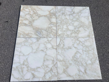 Calacatta Gold Giorgio 18x18 polished natural stone tile by RN, showcasing elegant white and gold veined marble surface.
