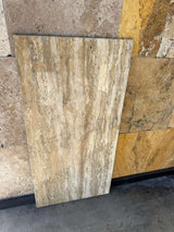 Italian Vein Cut Travertine natural stone tile in 18x36 size, filled and honed, by RN, showcasing smooth, elegant surface and veined pattern.