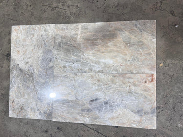Beige onyx natural stone tile, 12x24 polished surface from RN, showcasing smooth, glossy finish and elegant stone pattern.
