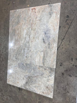 Beige Onyx natural stone tile 12x24 polished surface, showcasing smooth, glossy finish and elegant stone pattern.