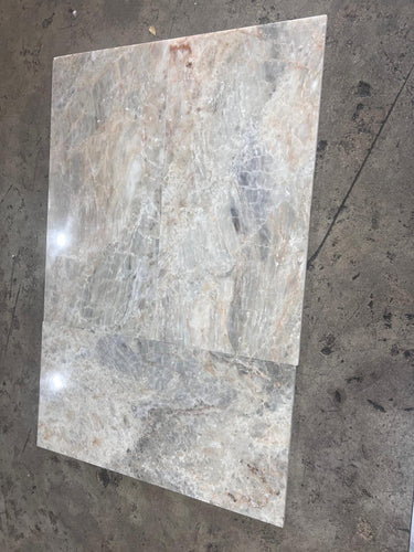 Beige Onyx natural stone tile 12x24 polished surface, showcasing smooth, glossy finish and elegant stone pattern.