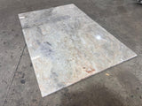 Beige Onyx 12x24 polished natural stone tile from RN, showing smooth, glossy surface with natural stone pattern and warm beige tones.
