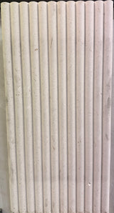 Honed Shellstone Myra fluted 12x24 limestone mosaic tile from SA, showcasing textured, natural stone surface with fluted design.