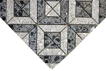 Terrazzo mosaic tile with structured geometric pattern in grey and black tones