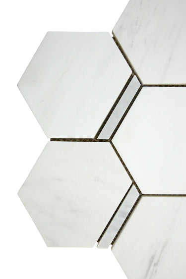 Dolomit Hex with Carrara Strip marble mosaic tile installed on a luxury bathroom wall