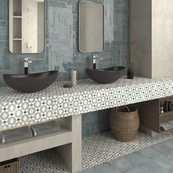 Roca Dune Atlantique Nantes Bleu 8x8 porcelain mosaic tile installed on a floor, showcasing blue and beige geometric pattern.