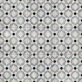 Decorative blue porcelain floor tile installation with vintage-inspired geometric pattern