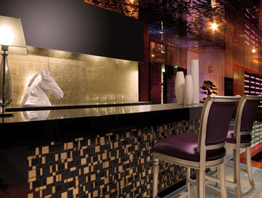 Decorative metallic glass tile installed as a luxury accent wall