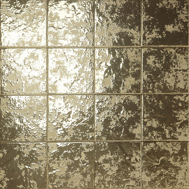 Decorative porcelain tile creating a statement feature wall with golden tones