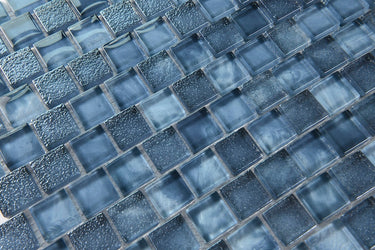 Garden Blue glass mosaic tile used as a kitchen backsplash featuring vibrant blue tones and contemporary glass mosaic styling.