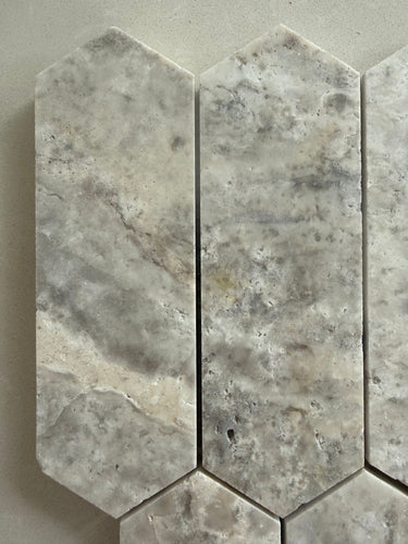 Honed Silver Travertine mosaic tile installed on a bathroom feature wall