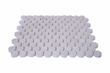 Limestone Penny Round Honed Mosaic Tile by Mythology Tile, showing smooth, rounded limestone tiles arranged in a mosaic pattern.