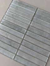 Warm neutral Dune glass mosaic tile used for a sophisticated kitchen backsplash