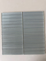 Lux Smoke 12x12 flutted glass mosaic wall tile by Roca showing textured, smoky gray glass tiles for modern interior decor.