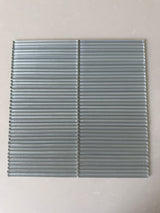 Roca Lux Smoke 12x12 flutted glass mosaic wall tile showing textured smoky glass surface with a modern design.