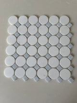Roca Blue Mix Thassos Circle mosaic natural stone tile with blue and white circular pattern for shower decor.
