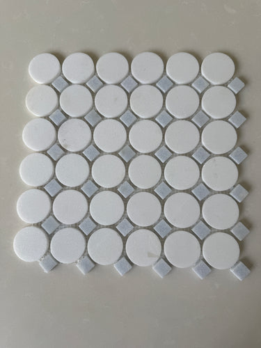 Roca Blue Mix Thassos Circle mosaic natural stone tile with blue and white circular pattern for shower decor.