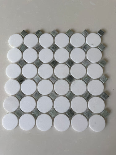 Natural stone tile mosaic featuring green mix Thassos circles from Roca, 12x12 inch size for feature walls.