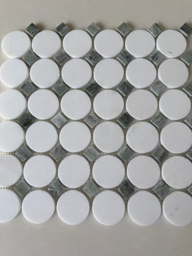 Roca Rockart Green Mix Thassos Circle mosaic tile for shower walls, featuring natural stone in green and white tones.