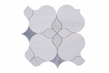 White flower waterjet honed marble mosaic tile by Mythology Tile with intricate floral pattern and smooth, polished surface.