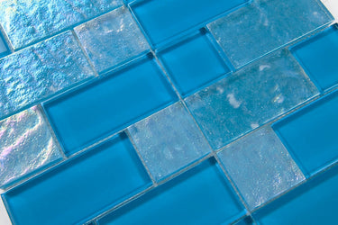 Crystal Aqua Osaka Sky Blue glass mosaic tile used as a kitchen backsplash featuring a decorative multiangular geometric pattern.