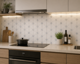 White, Thassos, and blue honed marble mosaic tile by Mythology Tile, showcasing a stylish wall design with smooth, polished surface.