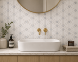 Triton White, Thassos, and Blue honed marble mosaic tile by Mythology Tile, featuring a decorative pattern for backsplash or wall design.