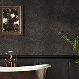 Close-up of Umbra Natural Stone Mosaic Tile by Mir, showcasing black and earthy stone pieces in a detailed mosaic pattern.