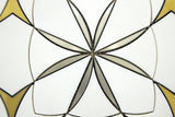 Waterjet Monaco Thassos brass mosaic tile installed on a luxury bathroom wall