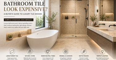 Luxury bathroom with large format travertine tile, glass shower, and natural stone flooring creating a high-end spa-like design