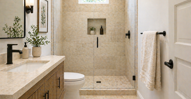 Small bathroom with travertine tile floor and light colored walls creating a bright open space