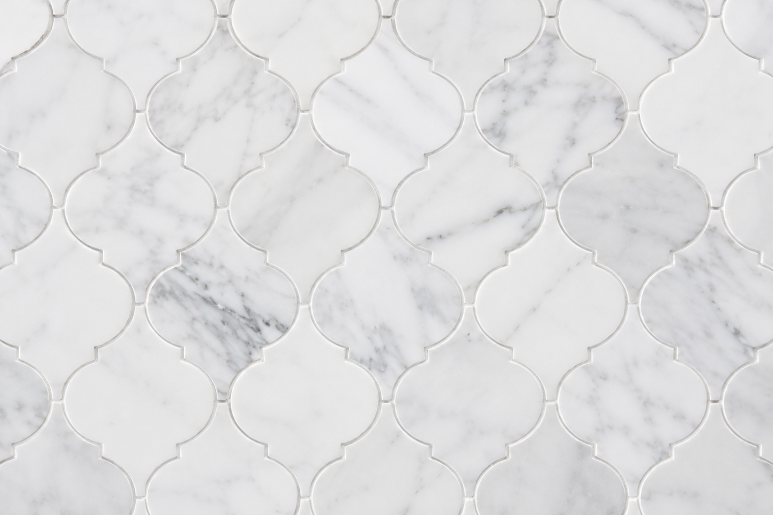 Elegant white arabesque marble tile pattern featuring premium natural stone with subtle gray veining in a seamless decorative mosaic design.