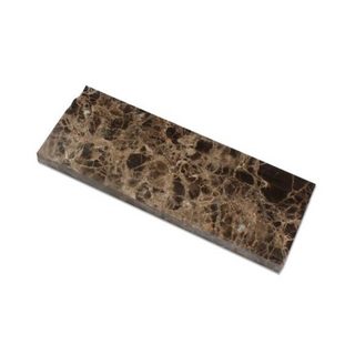 Premium Emperador Dark marble moldings and trim pieces featuring rich brown tones and distinctive natural veining for backsplashes, bathrooms, showers, fireplaces, and decorative wall installations.