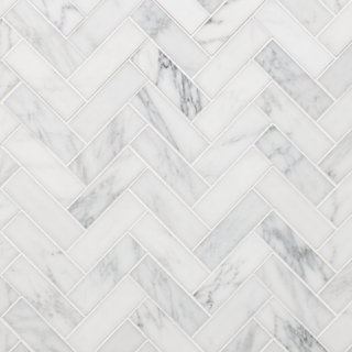 Herringbone marble tiles in Carrara Calacatta and Thassos for kitchen backsplash bathroom walls and shower design