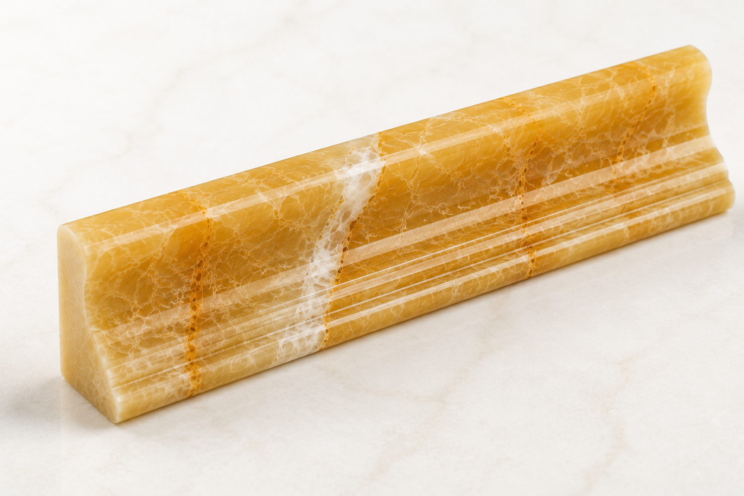 Premium Honey Onyx molding featuring rich golden tones and elegant natural veining for backsplashes, bathrooms, showers, fireplaces, and decorative wall installations.