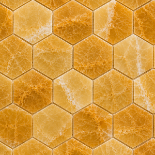 Premium Honey Onyx mosaic tiles featuring rich golden tones and elegant natural veining for kitchen backsplashes, bathrooms, showers, fireplaces, and feature walls.