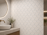 White marble waterjet mosaic tile with leaf pattern, designed for wall installation by Mythology Tile.