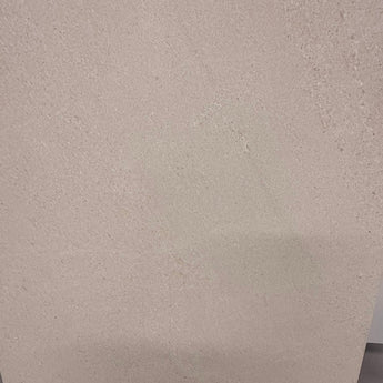 Honed Limra Limestone 12x24 natural stone tile with a smooth surface, showcasing beige and gray tones for floor or wall use.