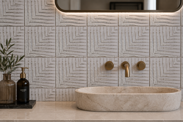 Mythology Tile Agape white gold marble geometric mosaic tile with intricate pattern and polished marble finish.