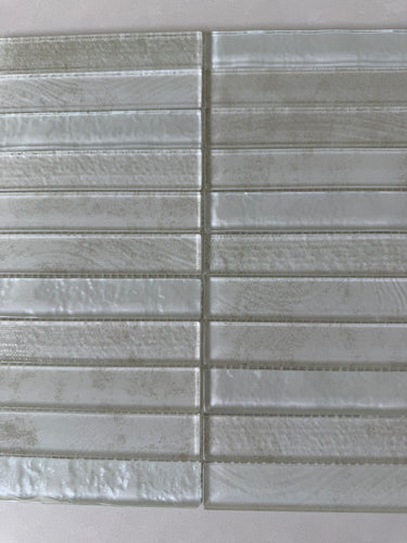 Roca Lux Dune 12x12 stacked glass mosaic wall tile with warm beige and sandy tones, arranged in a stacked pattern.