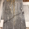 Polished Bardiglio Ciello 12x24 natural stone marble tile by RN, showing sleek gray and white veined surface for flooring or wall use.