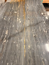 Polished Bardiglio Ciello 12x24 natural stone marble tile with gray and white veining, from RN, showcasing smooth, glossy surface.