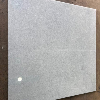 Polar white natural stone tile by RN, 24x48 polished ceramic tile with smooth, glossy surface and clean, modern appearance.