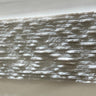 Ice White 6x12 3D split face marble tile by RN, showcasing natural stone with textured, geometric 3D surface in white tones.